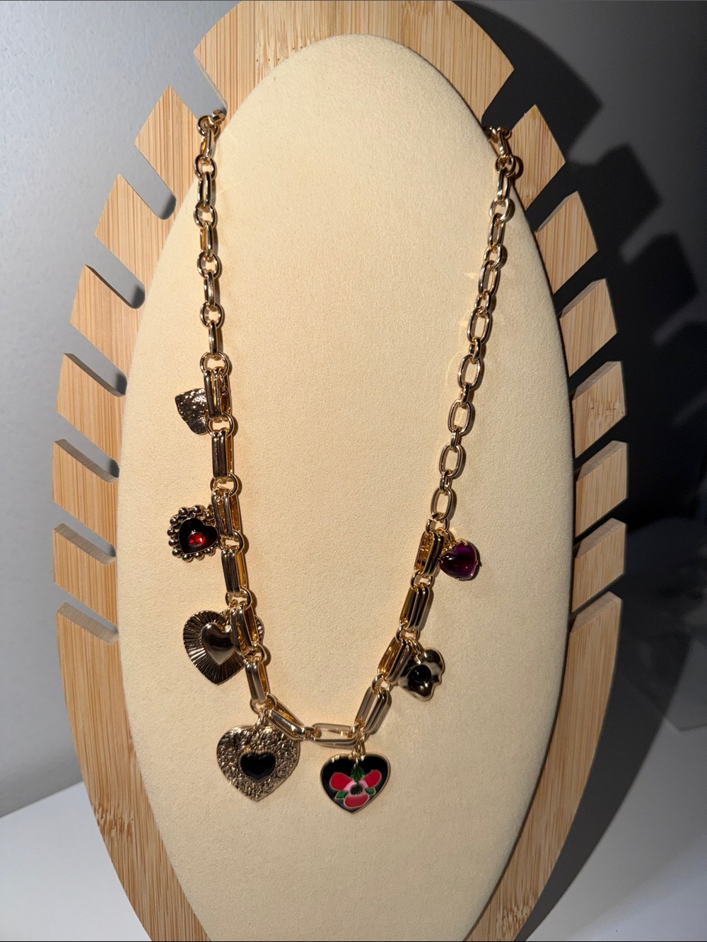 Gold Heart Charm Necklace with Red and Black Accents
